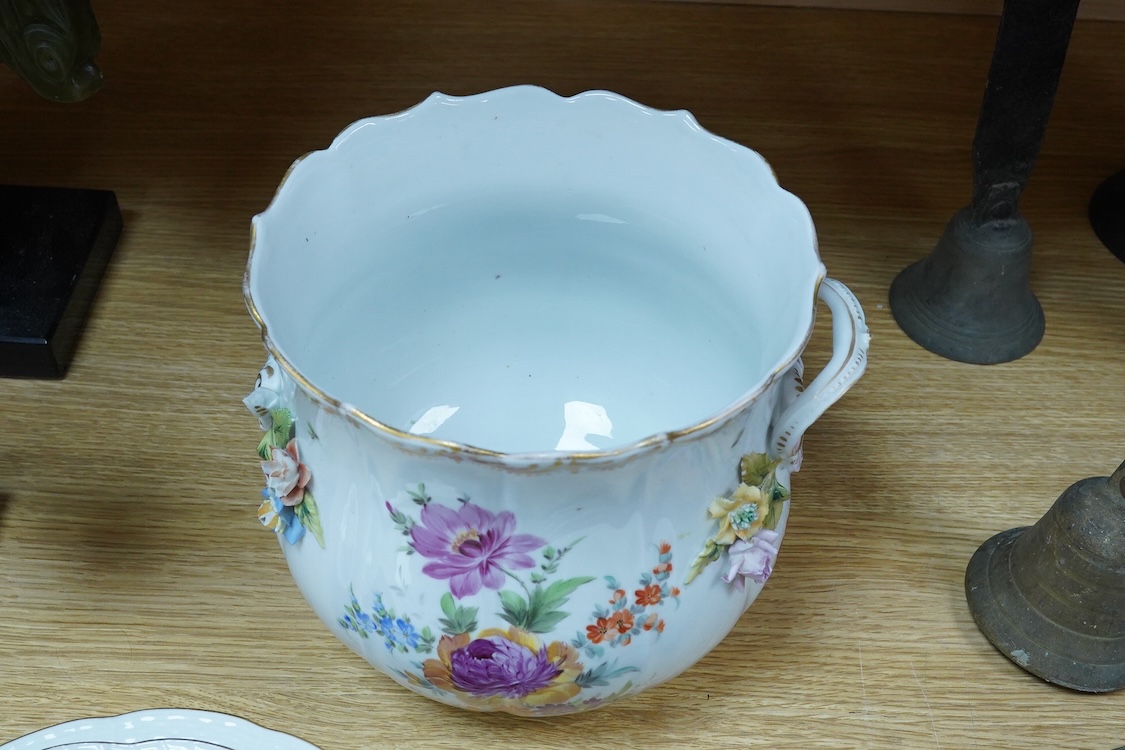 A collection of Meissen porcelain to include floral side plates and a German floral encrusted pot, 18cm high